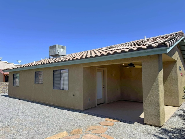 14713 E 52nd Dr, Yuma, AZ 85367 - rear view of property with a patio, cooling unit, a tiled roof, and stucco siding