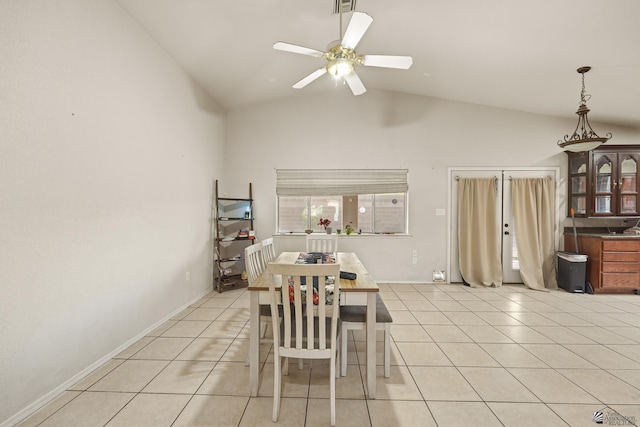 dining area with high vaulted ceiling, ceiling fan, baseboards, and light tile patterned flooring