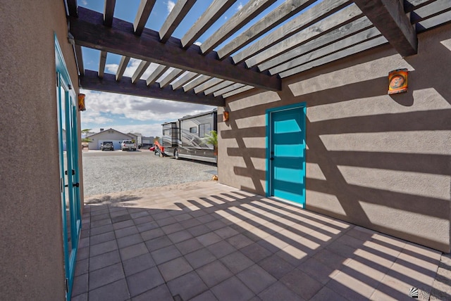 view of patio featuring a pergola