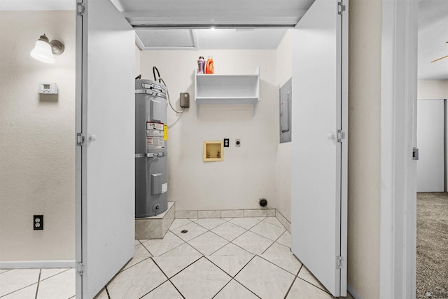 2155 S 14th Ave # 36, Yuma, AZ 85364 - laundry area featuring light tile patterned floors, washer hookup, laundry area, hookup for an electric dryer, and secured water heater
