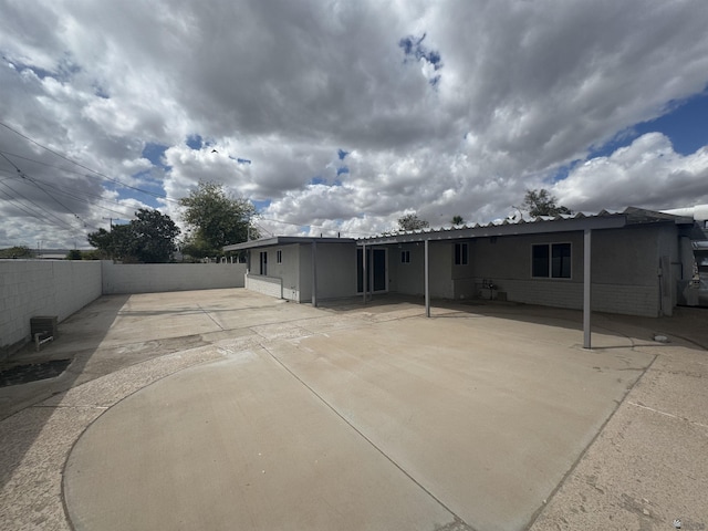 131 W 21st Pl, Yuma, AZ 85364 - rear view of house featuring a fenced backyard and a patio area