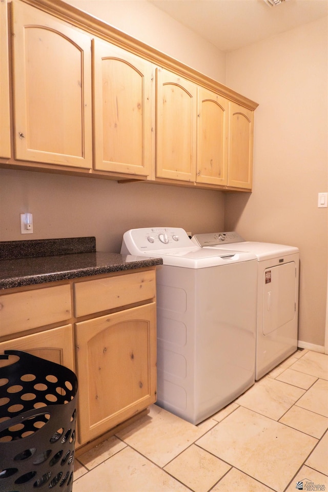 11519 E Del Verde St, Yuma, AZ 85367 - washroom featuring cabinet space, washer and dryer, and light tile patterned floors