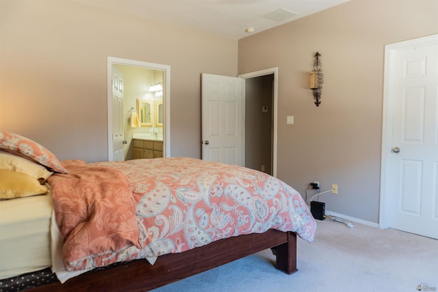 11519 E Del Verde St, Yuma, AZ 85367 - bedroom featuring carpet flooring, ensuite bathroom, and baseboards