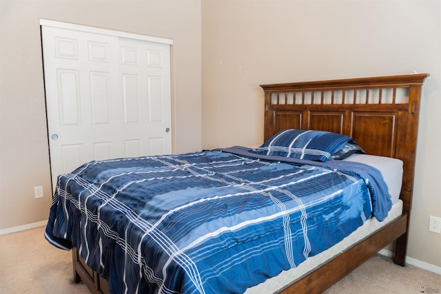 11519 E Del Verde St, Yuma, AZ 85367 - bedroom with light carpet, baseboards, and a closet