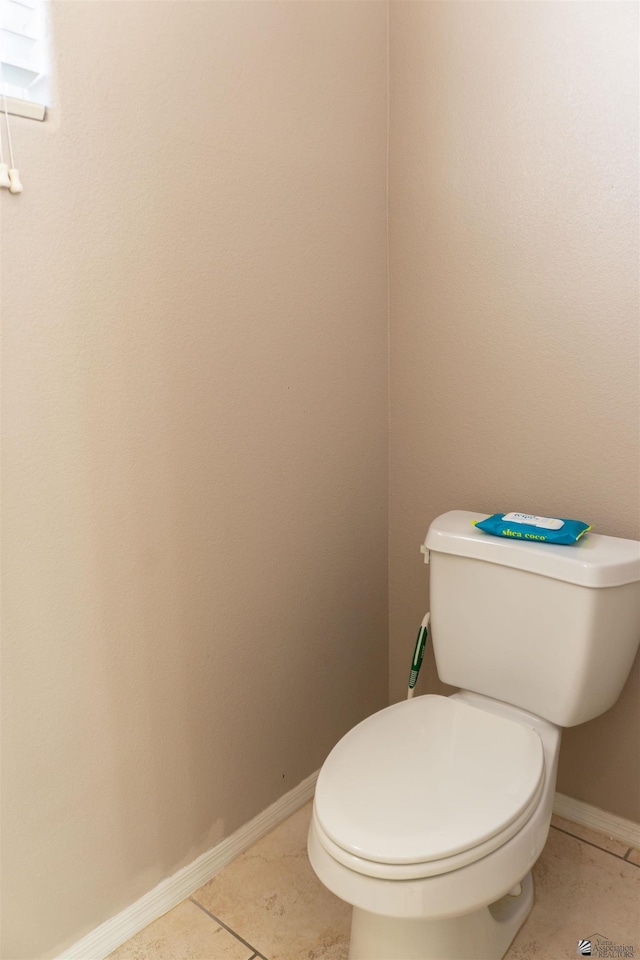 11519 E Del Verde St, Yuma, AZ 85367 - bathroom with toilet, baseboards, and tile patterned floors