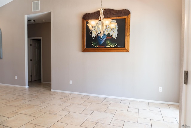 11519 E Del Verde St, Yuma, AZ 85367 - empty room featuring a chandelier and baseboards