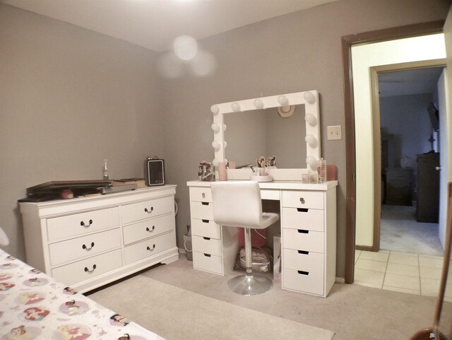 bedroom featuring light colored carpet
