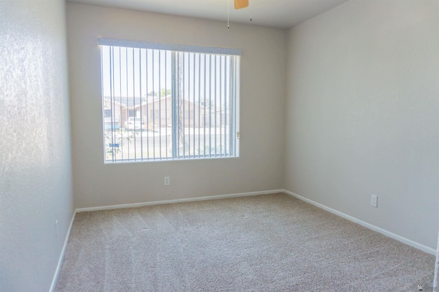 6351 E 41st St, Yuma, AZ 85365 - carpeted empty room with baseboards and a ceiling fan