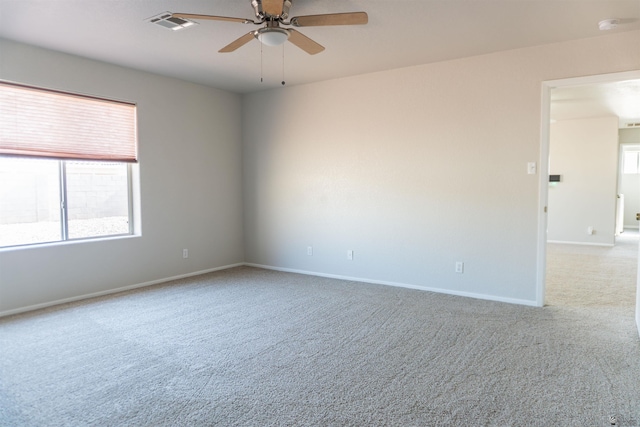 6351 E 41st St, Yuma, AZ 85365 - carpeted spare room with ceiling fan, baseboards, and a smoke detector