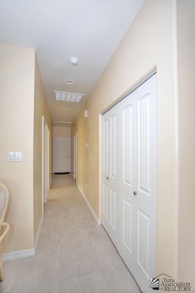 13459 E 43rd Ln, Yuma, AZ 85367 - hallway with baseboards and visible vents