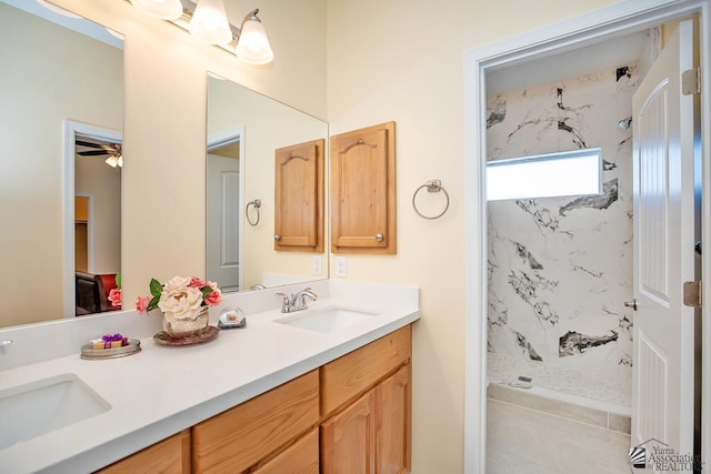 13459 E 43rd Ln, Yuma, AZ 85367 - full bath with double vanity, a shower stall, and a sink