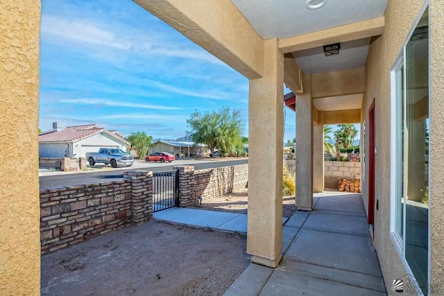 13459 E 43rd Ln, Yuma, AZ 85367 - view of patio / terrace featuring fence and a residential view