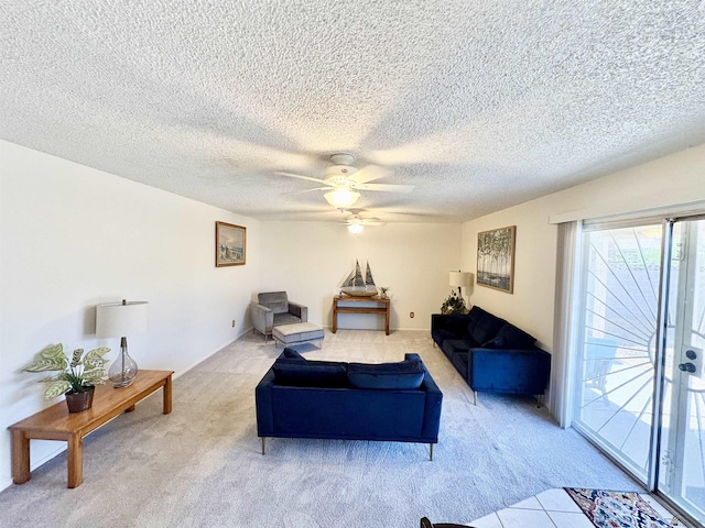 4447 W 14th Pl, Yuma, AZ 85364 - living area with carpet flooring, a ceiling fan, and a textured ceiling