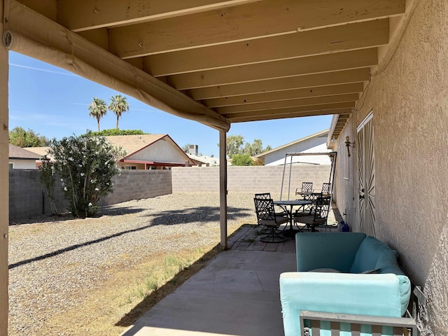 4447 W 14th Pl, Yuma, AZ 85364 - fenced backyard with outdoor dining area and a patio