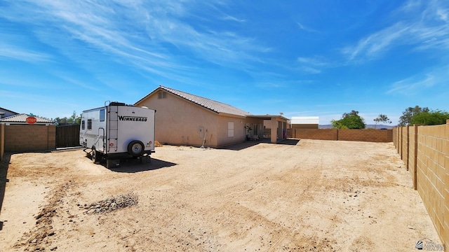 11569 Sonora St, Wellton, AZ 85356 - rear view of house featuring a fenced backyard and stucco siding