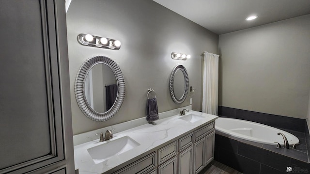 11569 Sonora St, Wellton, AZ 85356 - bathroom featuring double vanity, a bath, and recessed lighting