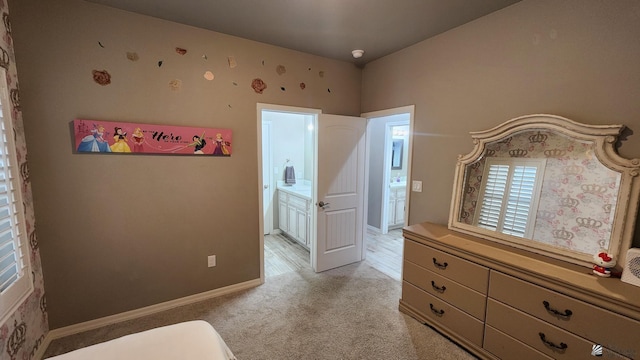 11569 Sonora St, Wellton, AZ 85356 - unfurnished bedroom featuring carpet floors, baseboards, and connected bathroom