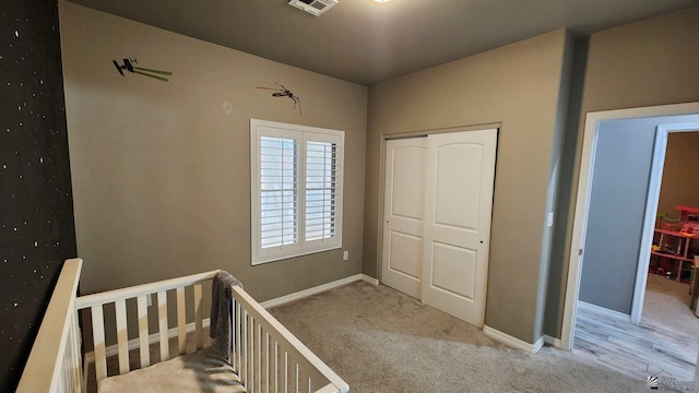 11569 Sonora St, Wellton, AZ 85356 - unfurnished bedroom with a closet, baseboards, and carpet flooring
