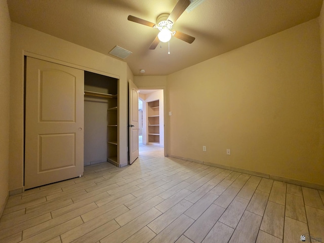 10791 S Sonora St, Yuma, AZ 85367 - unfurnished bedroom featuring a closet, baseboards, visible vents, and light wood-type flooring