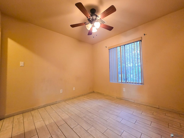 10791 S Sonora St, Yuma, AZ 85367 - unfurnished room with ceiling fan, baseboards, and light wood-style floors