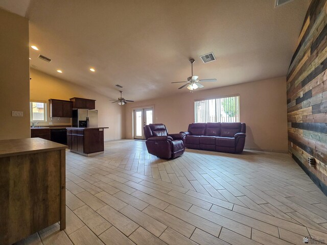 10791 S Sonora St, Yuma, AZ 85367 - living area with ceiling fan, visible vents, vaulted ceiling, and wood tiled floor