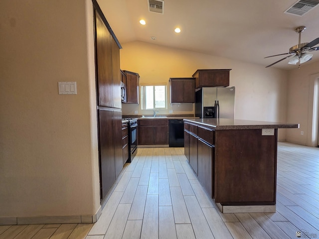 10791 S Sonora St, Yuma, AZ 85367 - kitchen with a kitchen island, a ceiling fan, visible vents, and black appliances