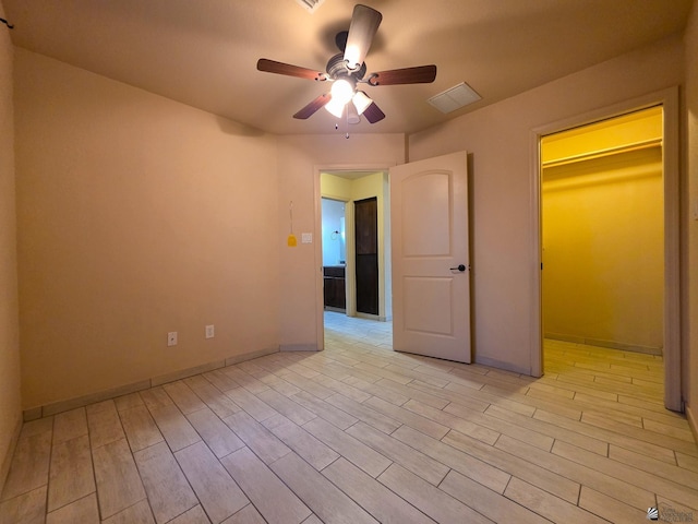 10791 S Sonora St, Yuma, AZ 85367 - unfurnished bedroom with visible vents, light wood-style floors, ceiling fan, and baseboards
