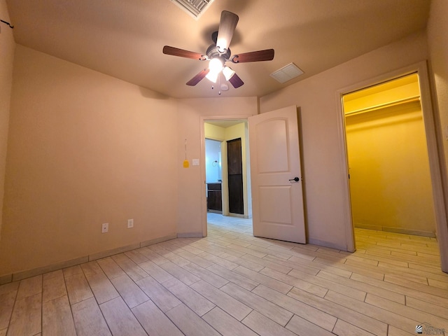 10791 S Sonora St, Yuma, AZ 85367 - unfurnished bedroom with visible vents, light wood finished floors, ceiling fan, and baseboards