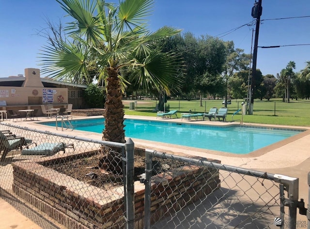 500 E Country Club Dr # 24, Yuma, AZ 85365 - community pool featuring a lawn, fence, and a patio area