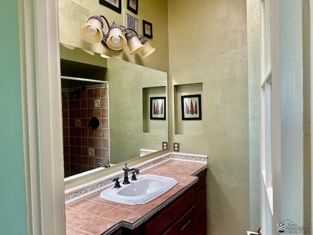 500 E Country Club Dr # 24, Yuma, AZ 85365 - bathroom with a textured wall and vanity