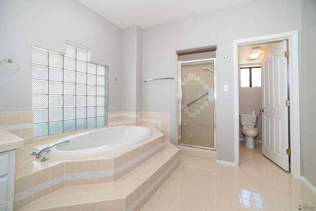 10388 S Fairway Loop, Yuma, AZ 85367 - bathroom featuring a bath, a shower stall, tile patterned flooring, and vanity
