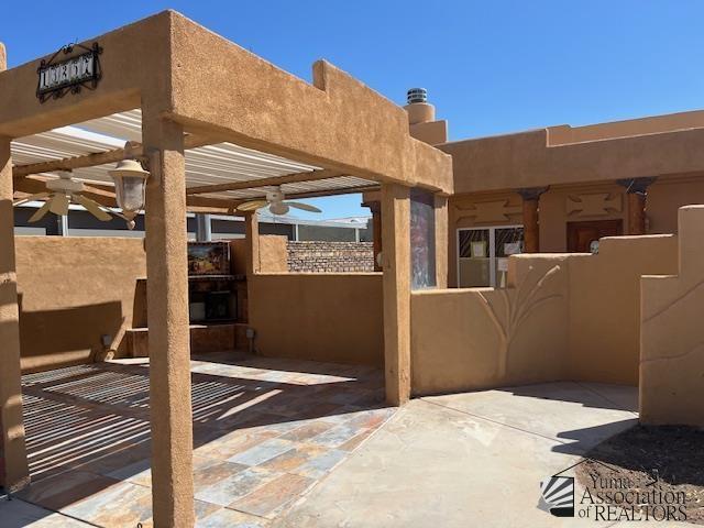 13257 E 55th Dr, Yuma, AZ 85367 - view of patio / terrace with a ceiling fan