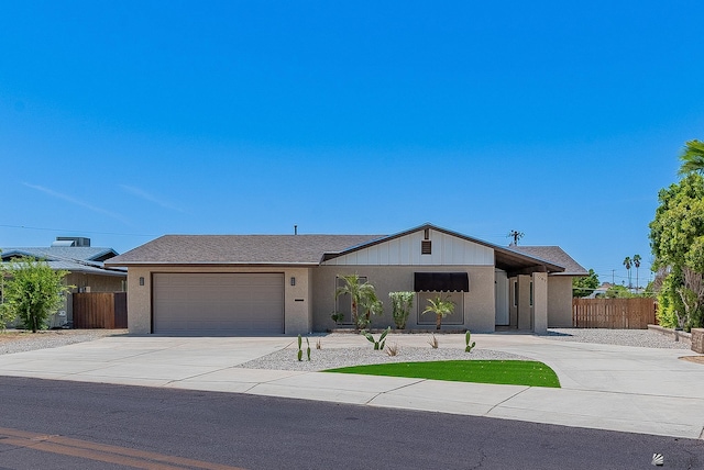 1087 W Palmcroft Dr, Yuma, AZ 85364 - view of front of home with driveway and an attached garage