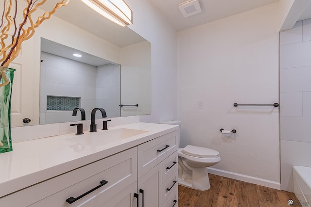 1087 W Palmcroft Dr, Yuma, AZ 85364 - bathroom featuring vanity and wood finished floors