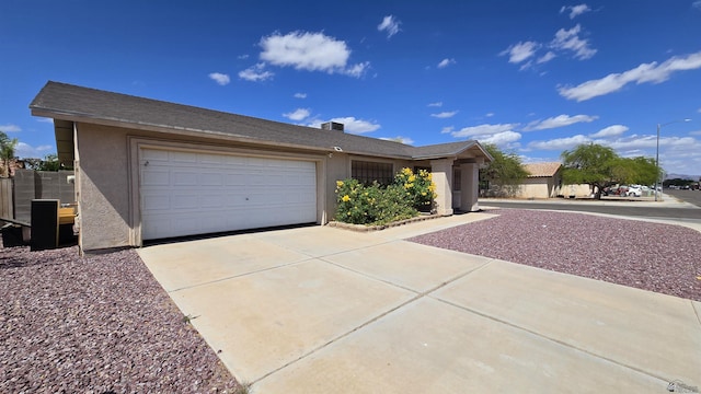 7196 E 25th Pl, Yuma, AZ 85365 - ranch-style home with concrete driveway, stucco siding, and a garage
