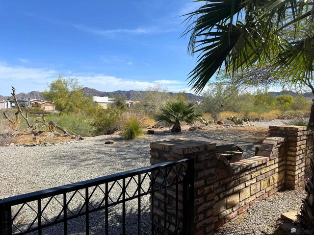 14818 E 52nd St, Yuma, AZ 85367 - view of yard with fence and a mountain view