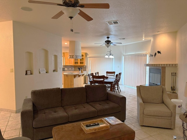 14818 E 52nd St, Yuma, AZ 85367 - living room with ceiling fan, light tile patterned flooring, and visible vents