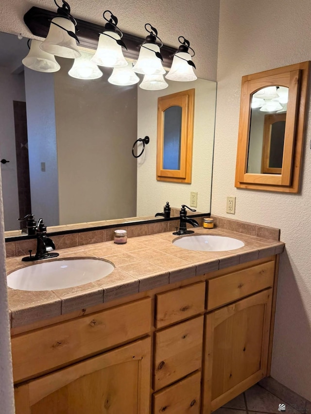 14818 E 52nd St, Yuma, AZ 85367 - full bath featuring a sink, tile patterned flooring, a textured wall, and double vanity
