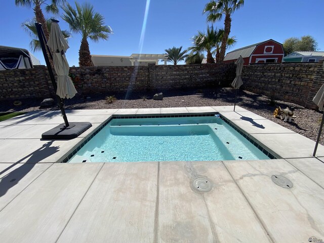 14673 E 52nd St, Yuma, AZ 85367 - view of pool featuring a patio, a fenced backyard, and a swimming pool