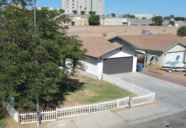 2461 S 17th Ave, Yuma, AZ 85364 - ranch-style house with a garage, concrete driveway, and stucco siding