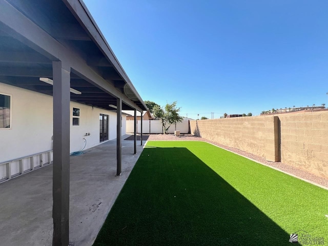 2461 S 17th Ave, Yuma, AZ 85364 - fenced backyard featuring a patio