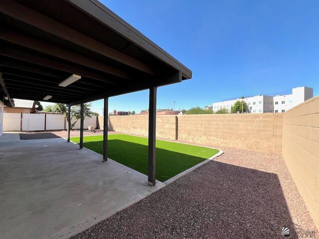 2461 S 17th Ave, Yuma, AZ 85364 - fenced backyard featuring a patio area