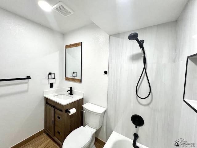 2461 S 17th Ave, Yuma, AZ 85364 - full bathroom featuring vanity, bathtub / shower combination, and wood finished floors