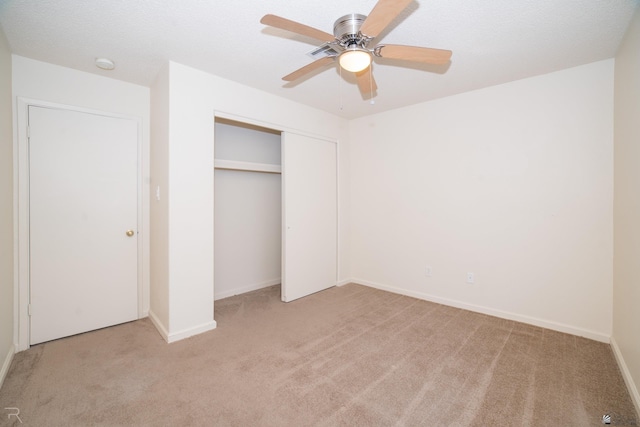 2794 W 27th Ln, Yuma, AZ 85364 - unfurnished bedroom with light colored carpet, a closet, and ceiling fan