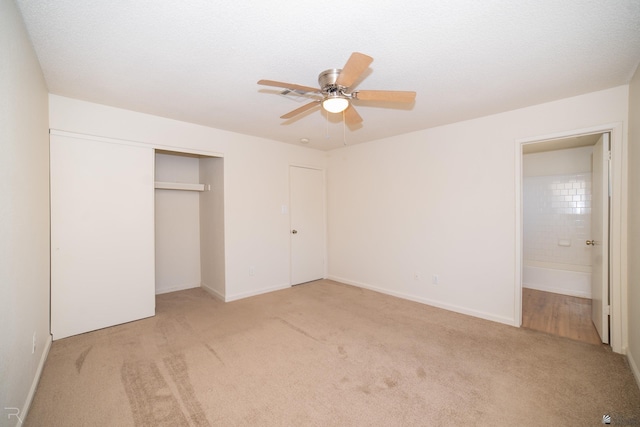 2794 W 27th Ln, Yuma, AZ 85364 - unfurnished bedroom with light carpet, a closet, and a ceiling fan