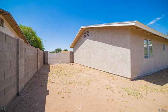 2794 W 27th Ln, Yuma, AZ 85364 - view of home's exterior featuring a fenced backyard and stucco siding