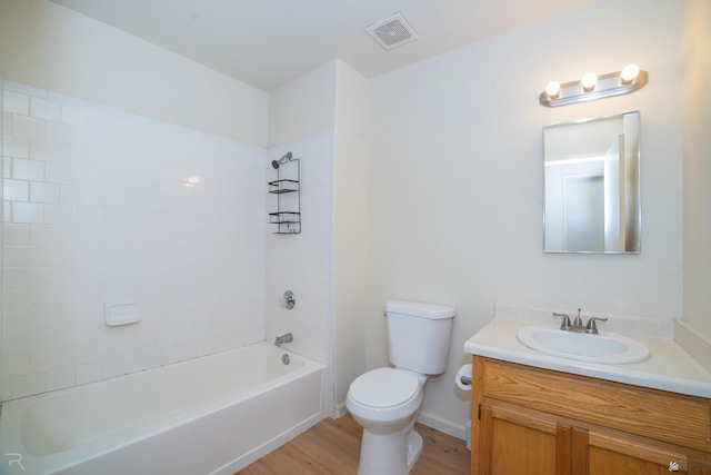 2794 W 27th Ln, Yuma, AZ 85364 - bathroom featuring vanity, wood finished floors, and tub / shower combination