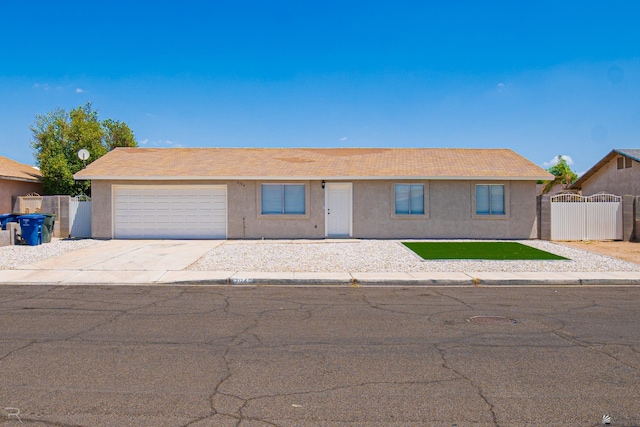 2794 W 27th Ln, Yuma, AZ 85364 - ranch-style home with stucco siding, concrete driveway, and a garage