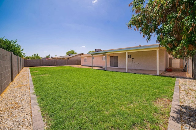 2794 W 27th Ln, Yuma, AZ 85364 - fenced backyard featuring a patio area