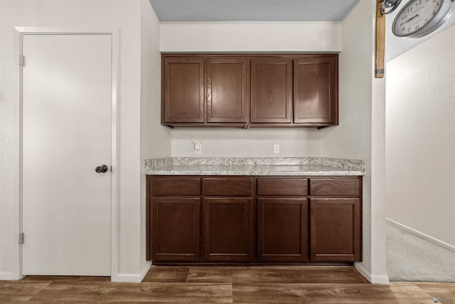 4841 W 10th Pl, Yuma, AZ 85364 - kitchen with light countertops and dark wood-type flooring